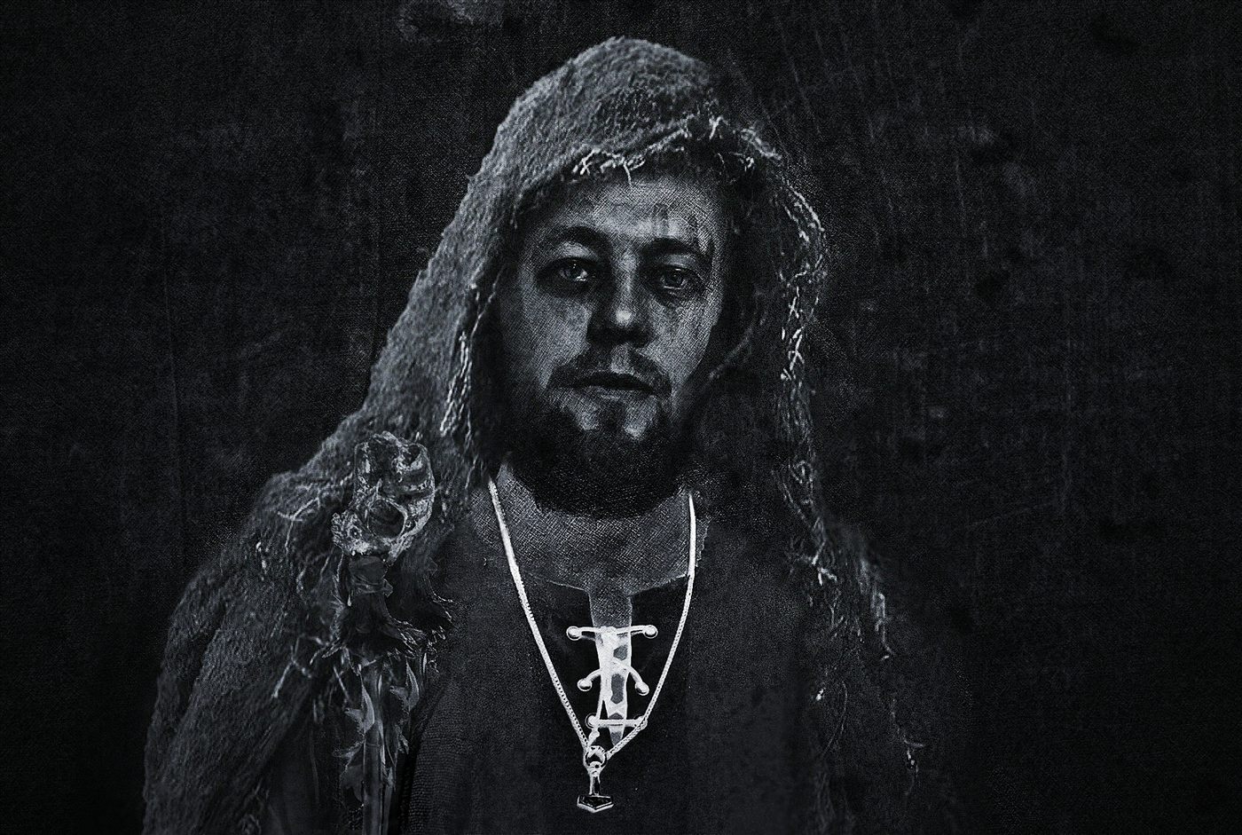 Danheim in a hooded cloak, black and white portrait